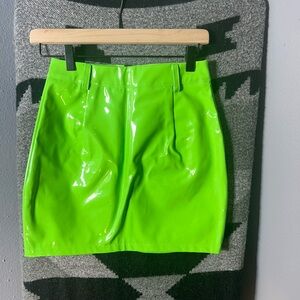 Neon green patent leather mini skirt